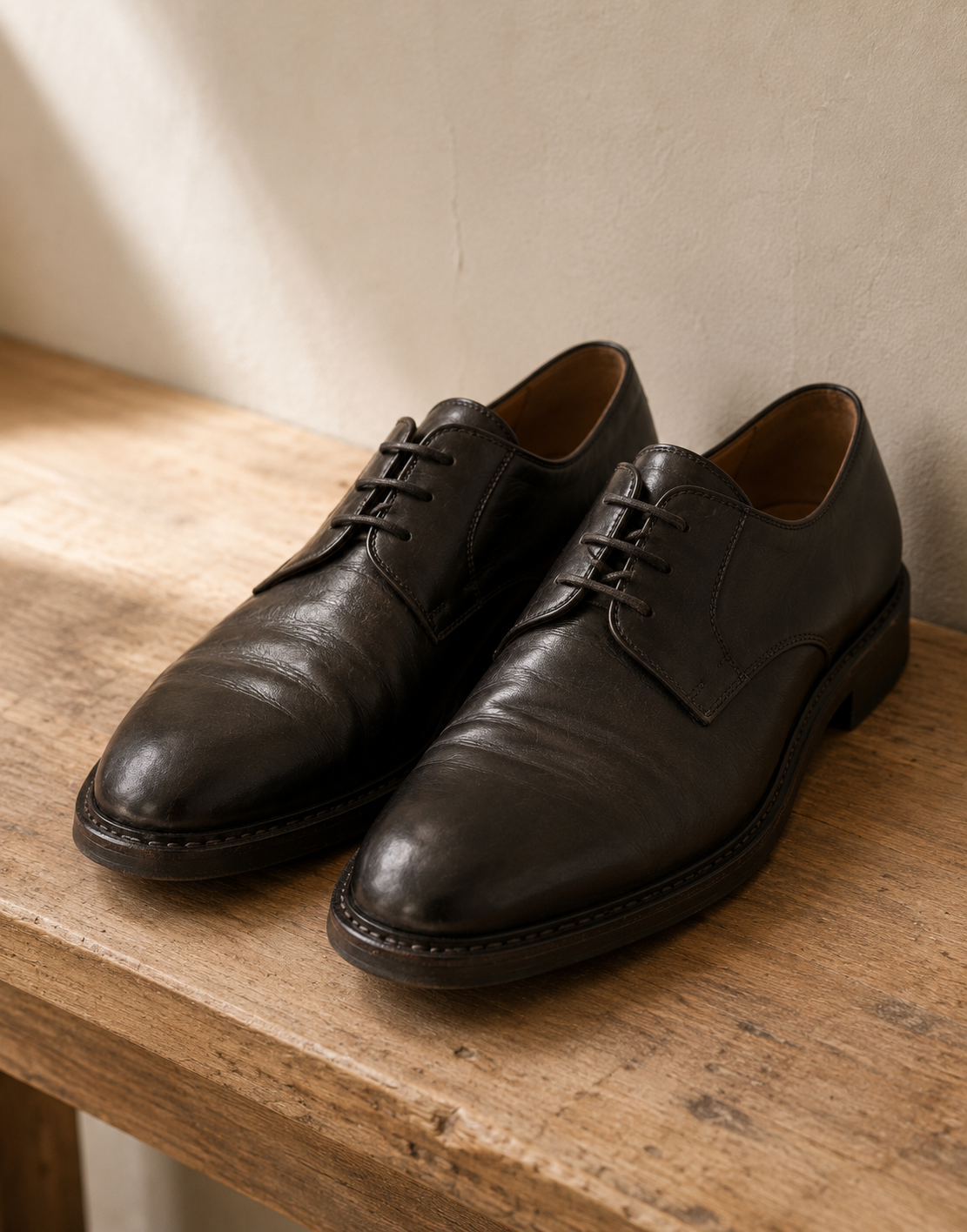 Hand-lasted leather derbies, worn in by hand